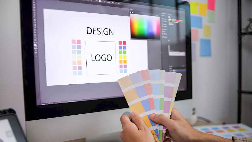 In-House Design vs Using Your Own Designer: What to Expect from a Printer’s Design Service